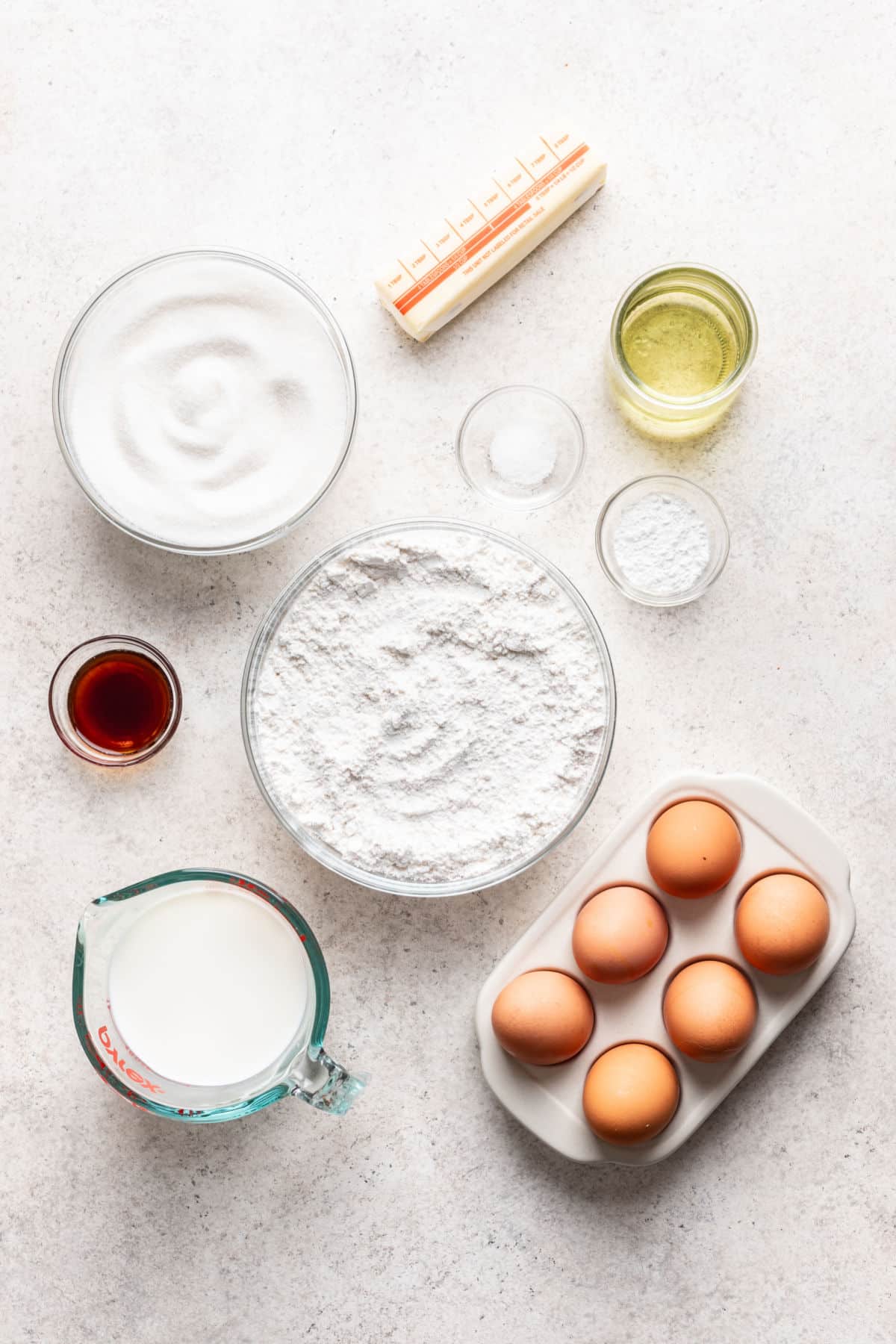 Ingredients for caramel cake in dishes.
