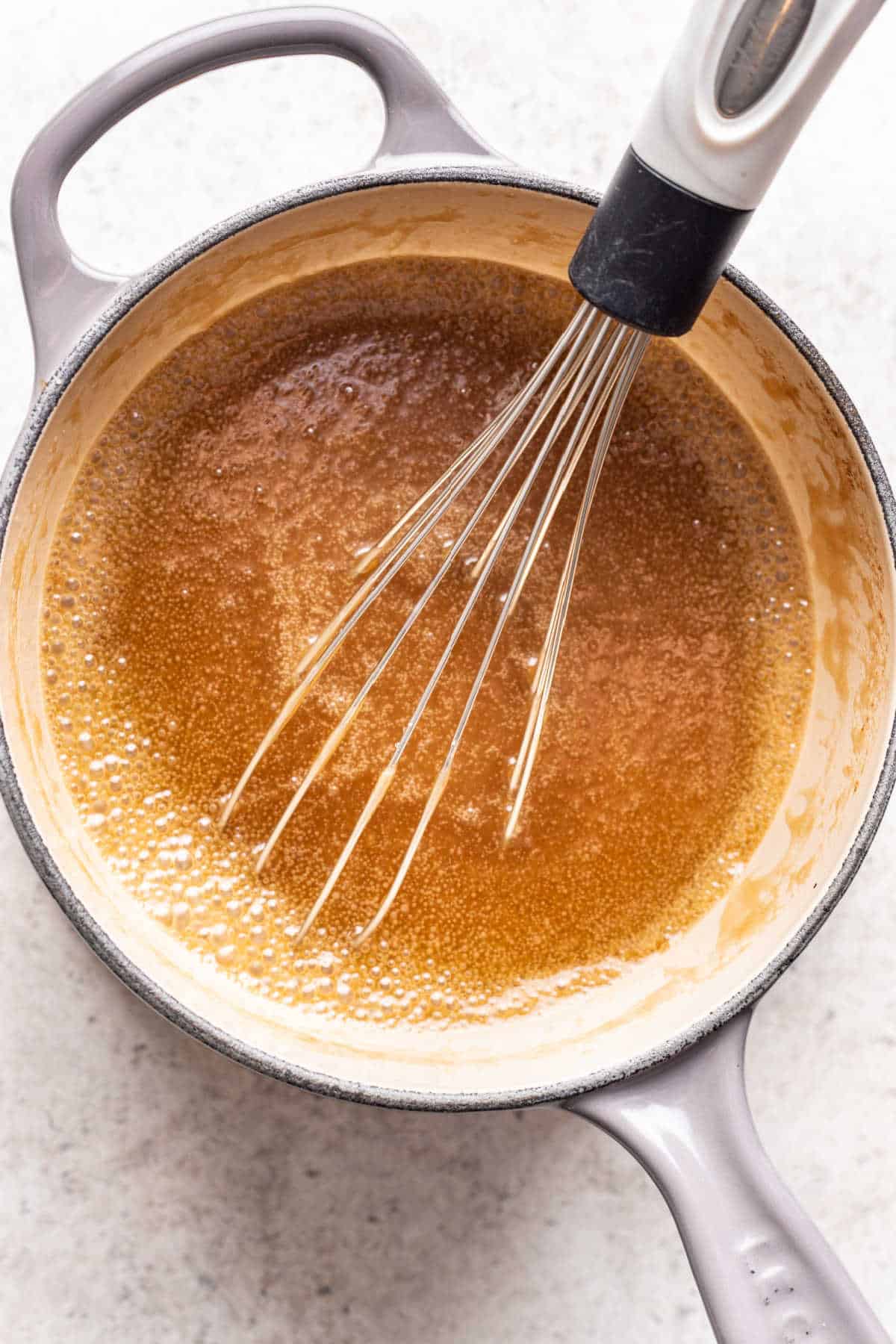 Heavy cream whisked into brown sugar mixture.