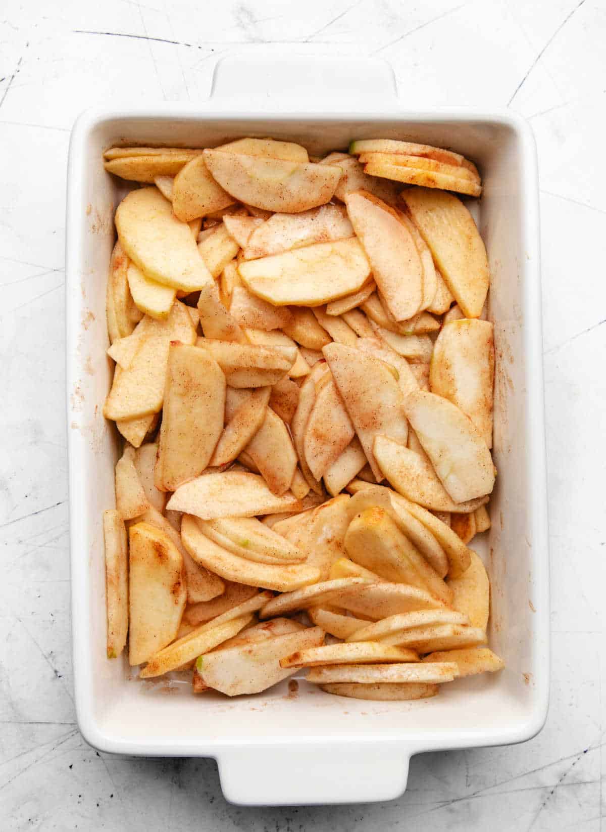 Apple filling in a baking pan.