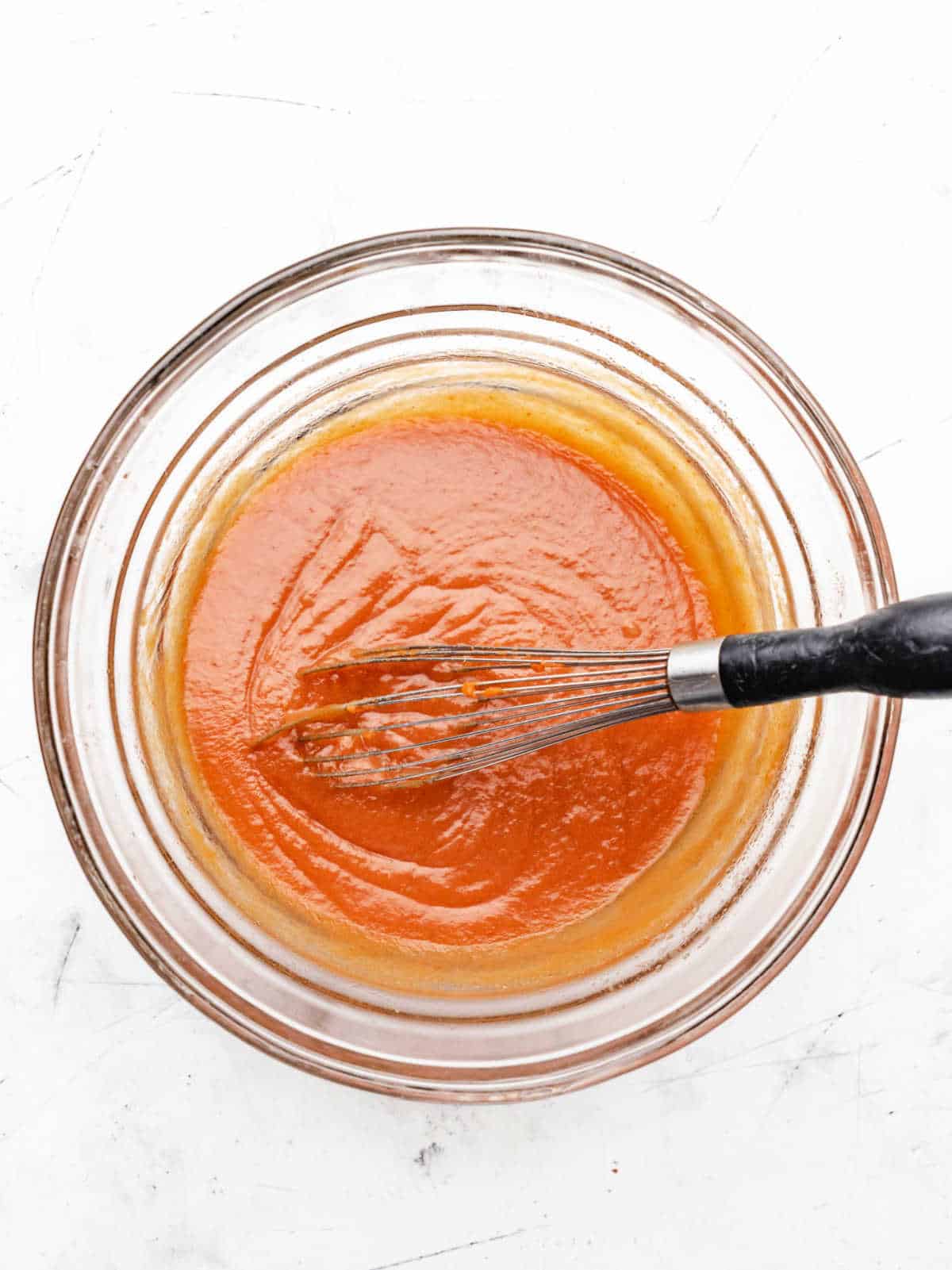 Pumpkin egg yolk and vanilla mixed into butter and sugar mixture.