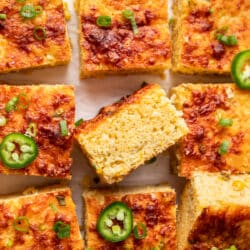 Cut slices of Mexican cornbread with one turned on its side.