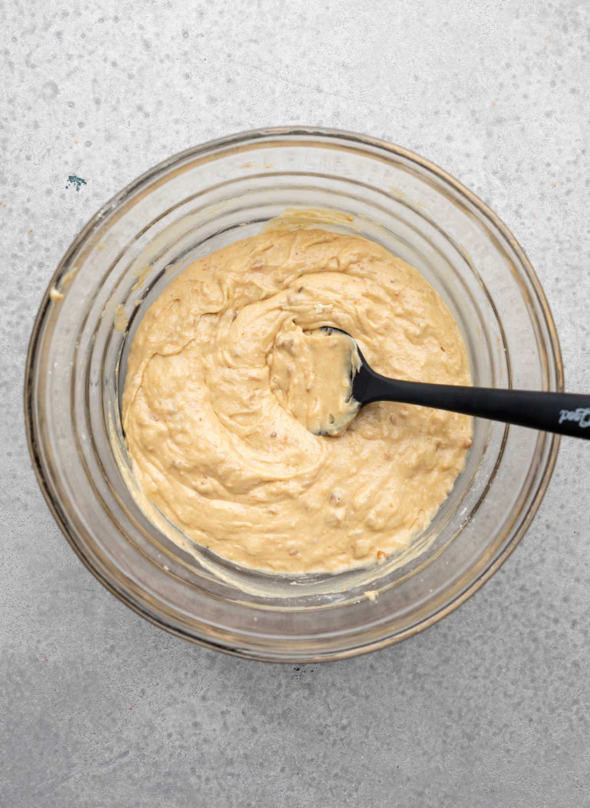 Dates and water mixed into dry ingredients for date nut bread.