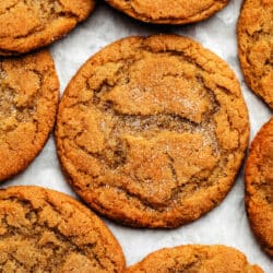 Overlapping maple doodles on a piece of white parchment paper.