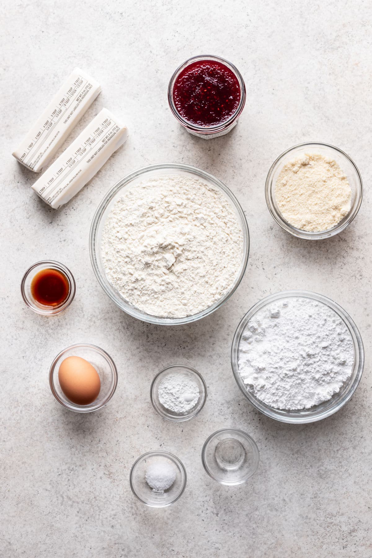 Ingredients for linzer cookies in dishes.