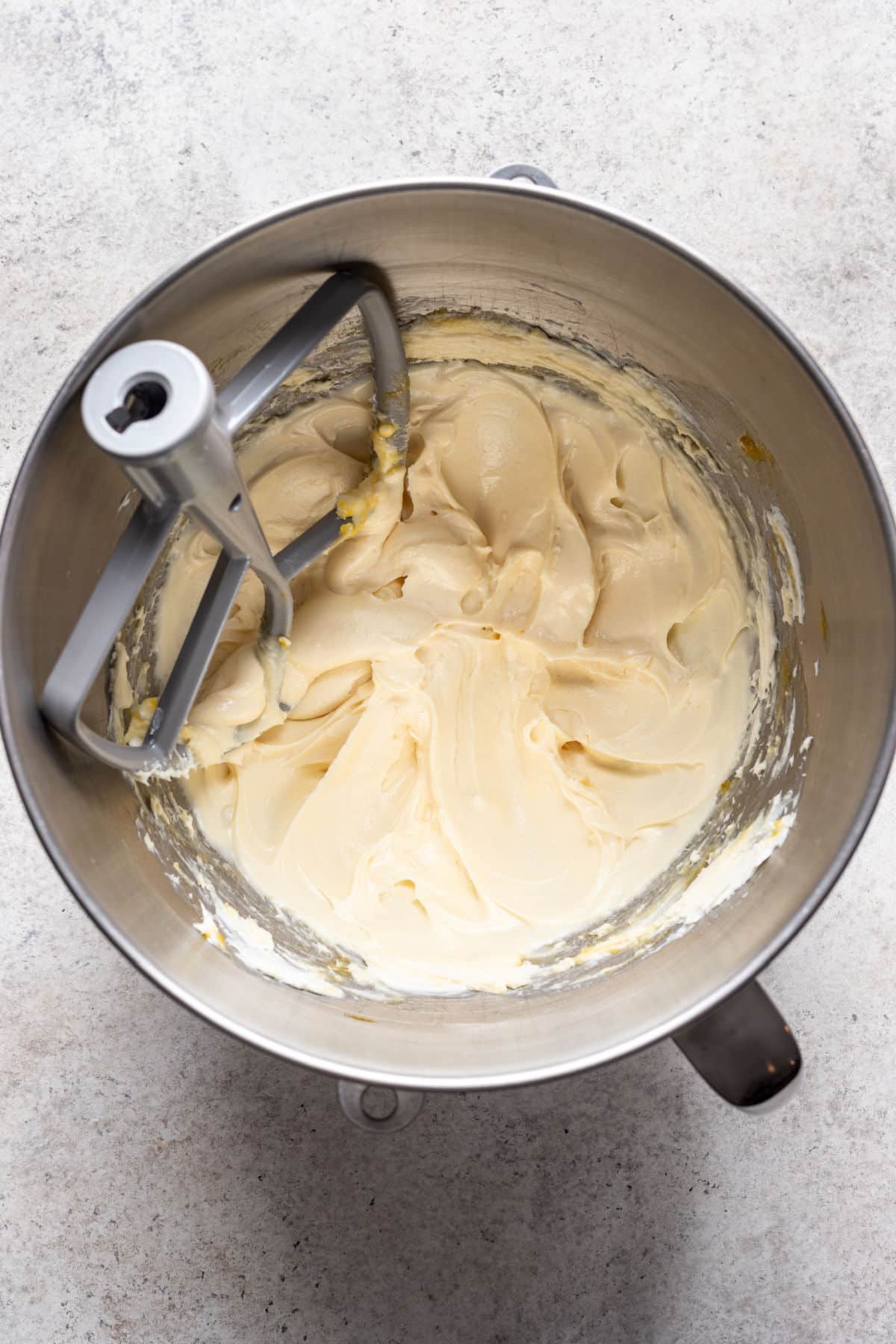 Cream cheese danish filling in a mixing bowl.