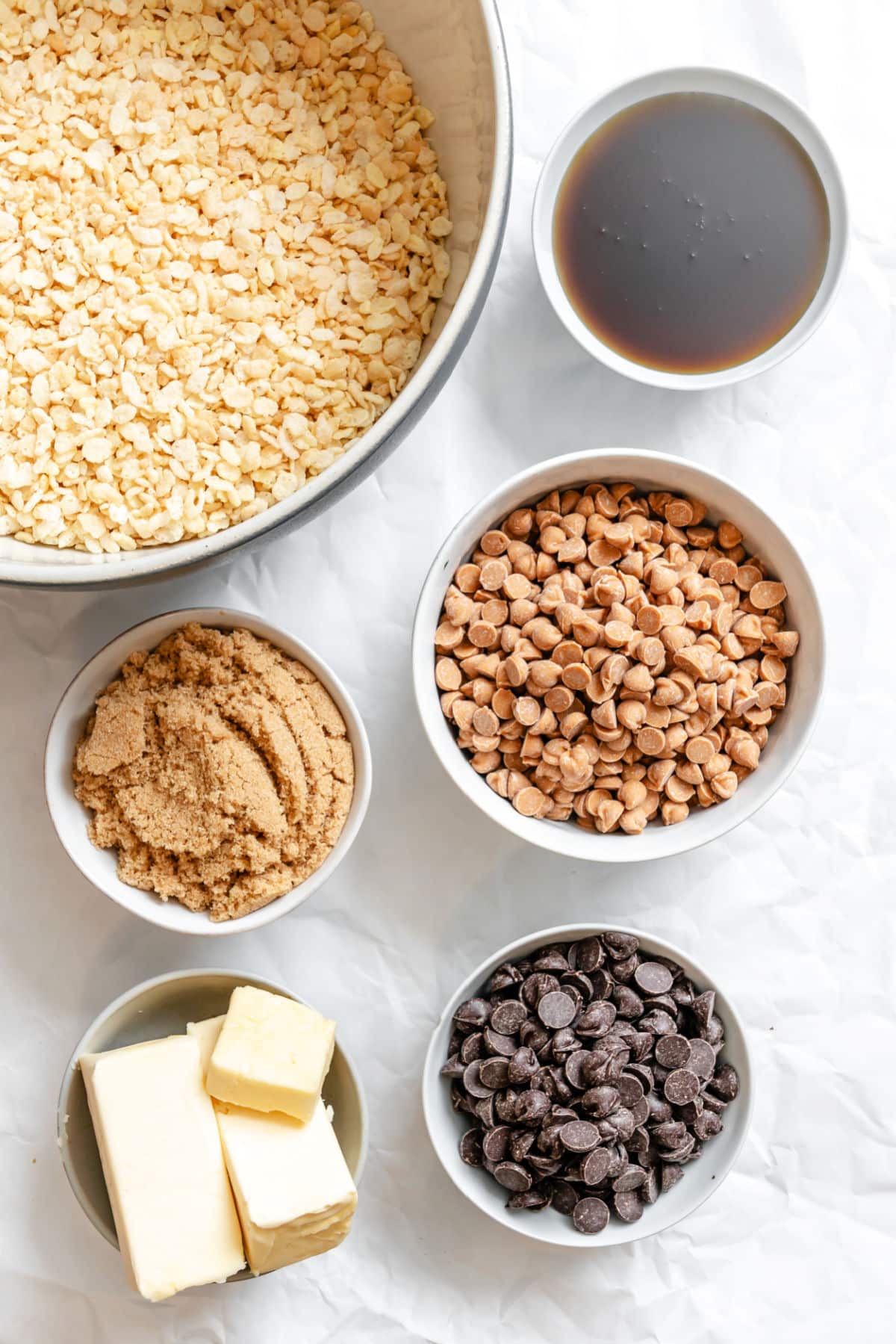 Ingredients for butterscotch rice krispie treats in dishes.