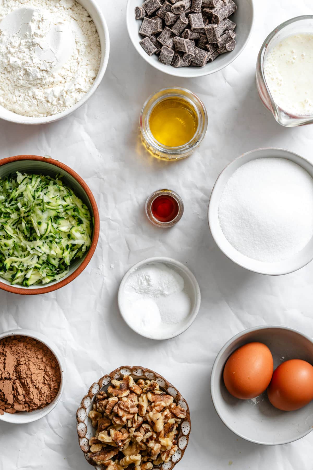Ingredients for chocolate zucchini bread in dishes.