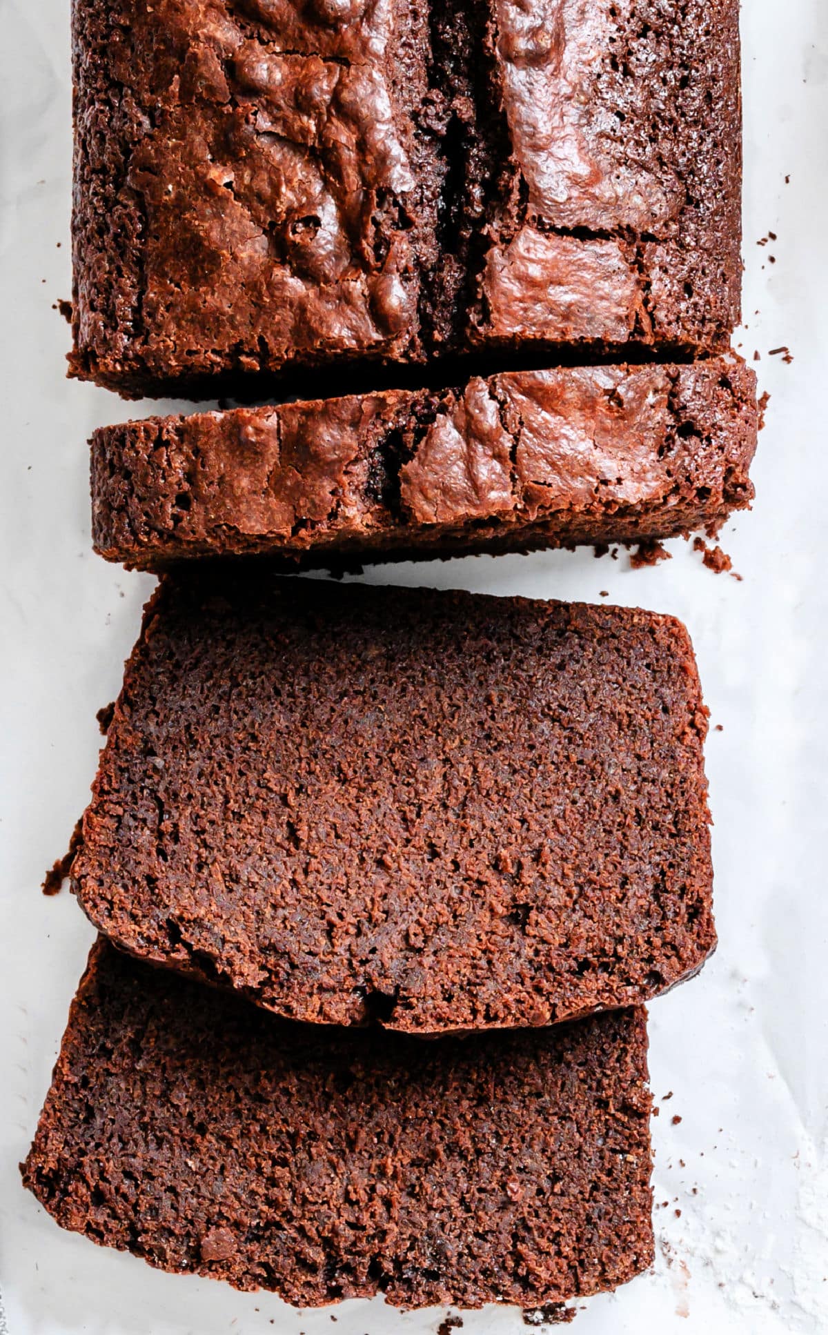 Chocolate Pound Cake Slices of chocolate pound cake against the cake.