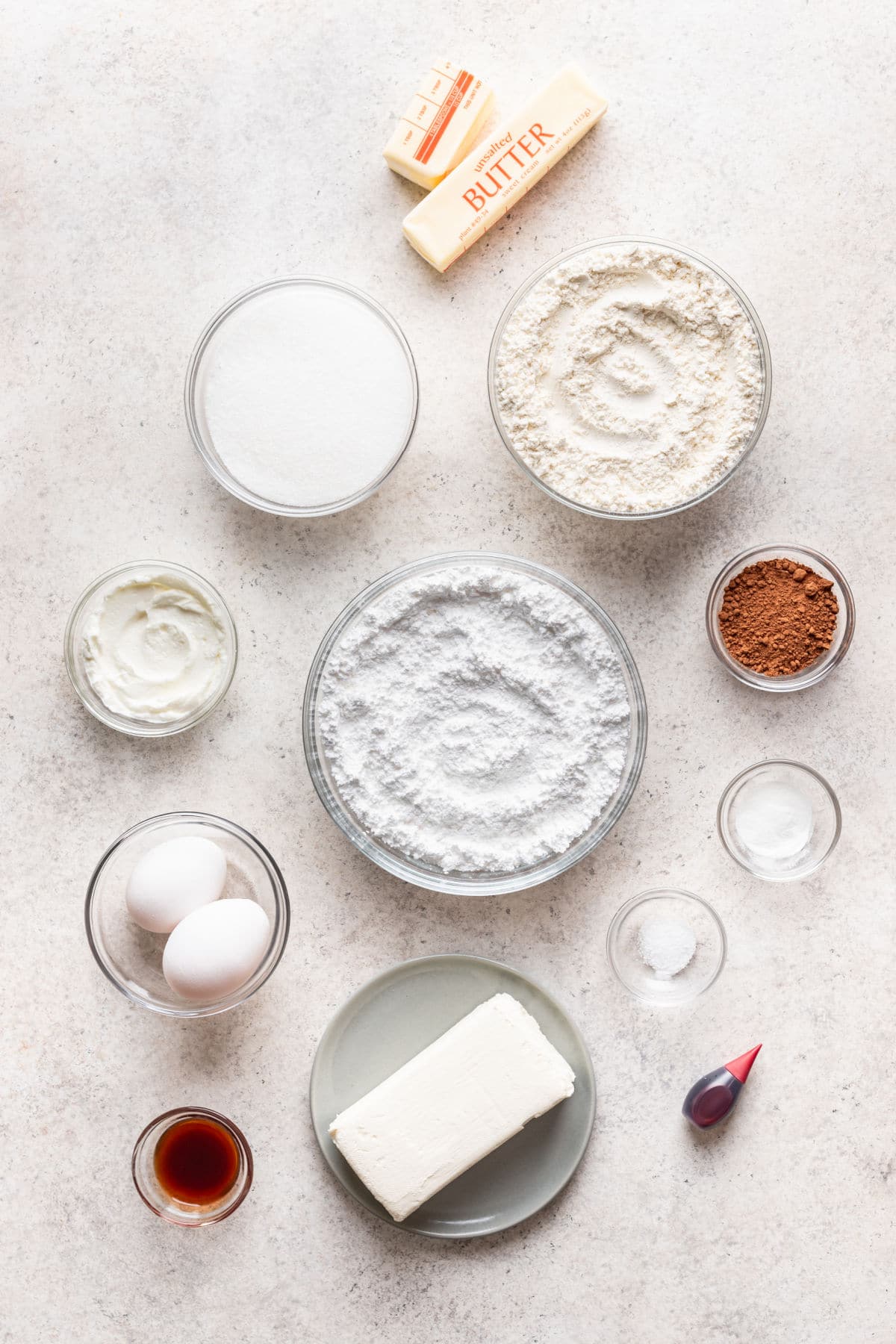 Ingredients for red velvet cupcake cookies in dishes.