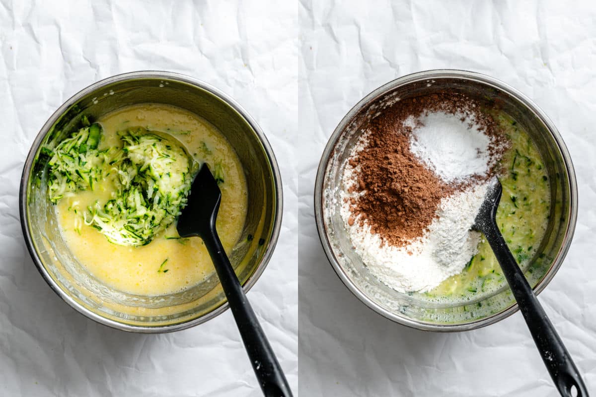 Grated zucchini on top of wet ingredients in a mixing bowl next to dry ingredients on wet ingredients in a mixing bowl.