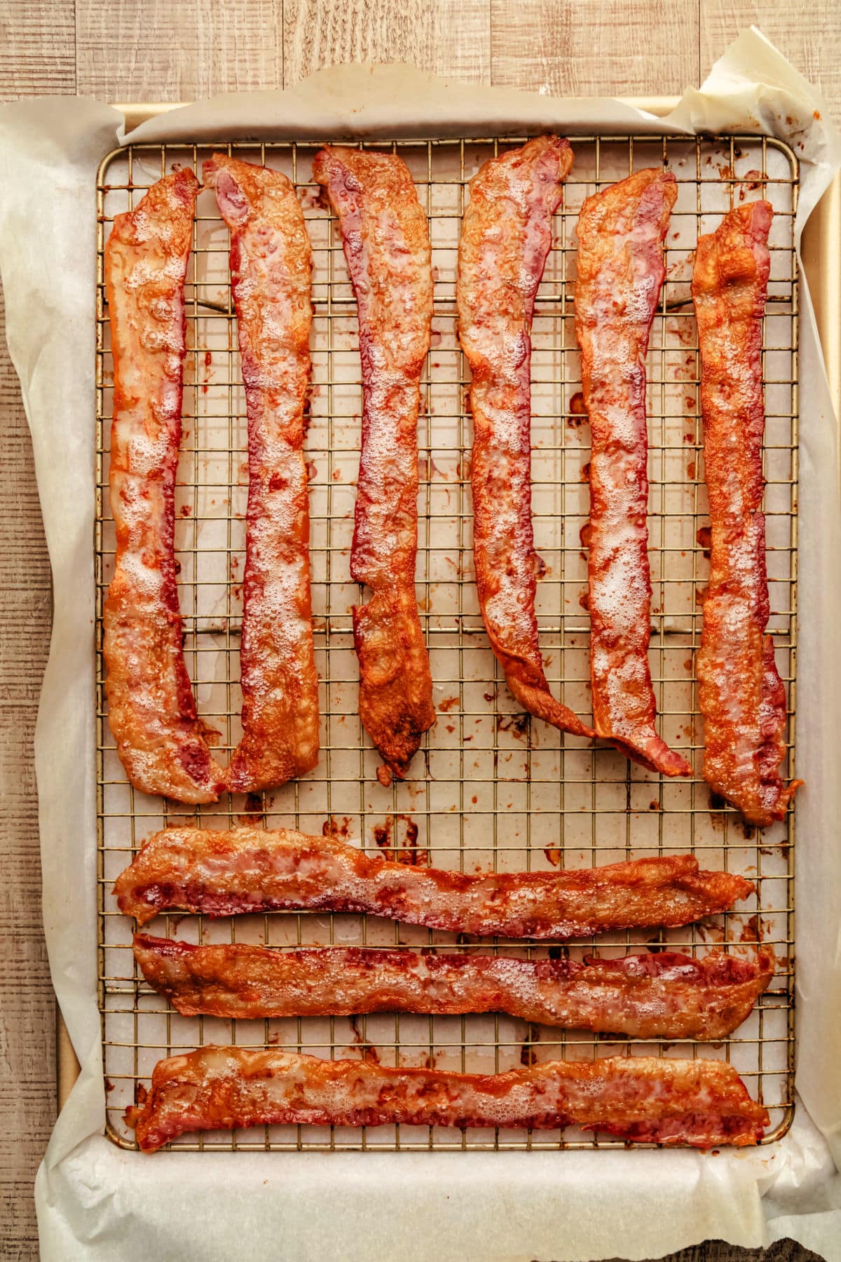 A tray of cooked bacon.