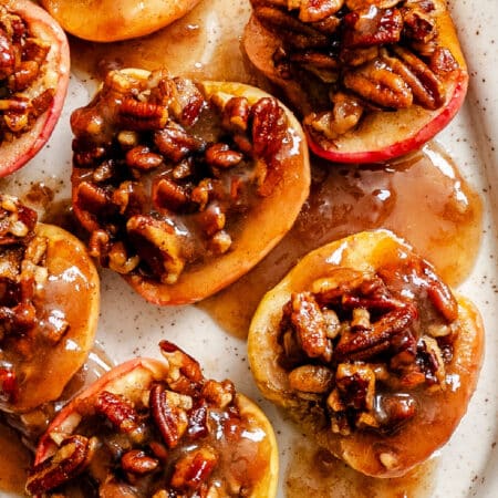 A serving platter with easy baked apples on it.