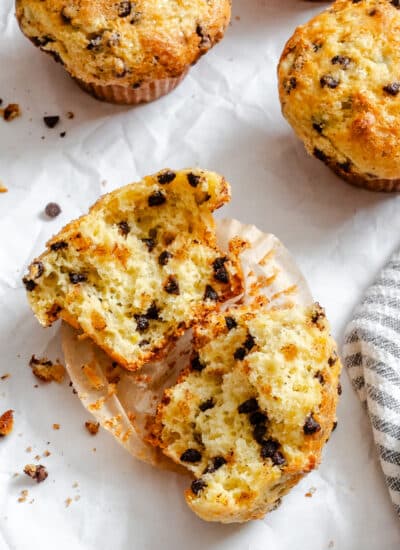 A chocolate chip cottage cheese muffin broken in half.