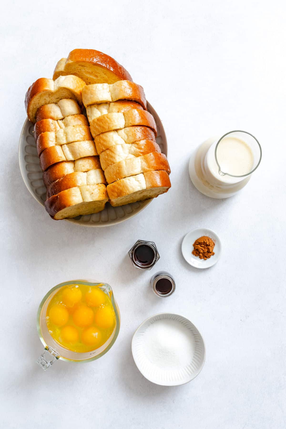 Ingredients for French toast waffles in dishes.