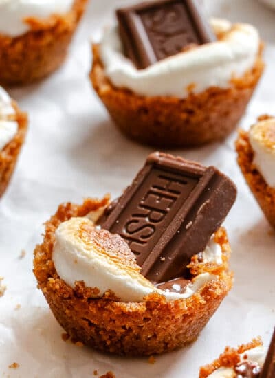 S'mores cups on a piece of white parchment paper.