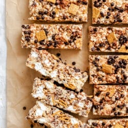 S'mores Rice Krispies treats cut into bars with three on their sides.
