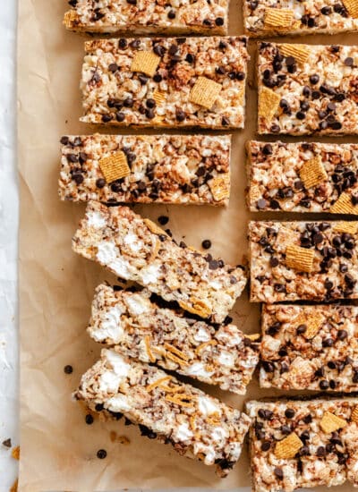 S'mores Rice Krispies treats cut into bars with three on their sides.