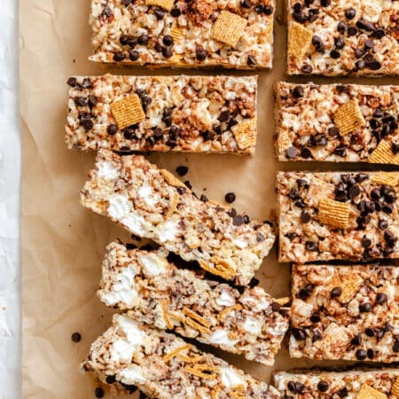 S'mores Rice Krispies treats cut into bars with three on their sides.