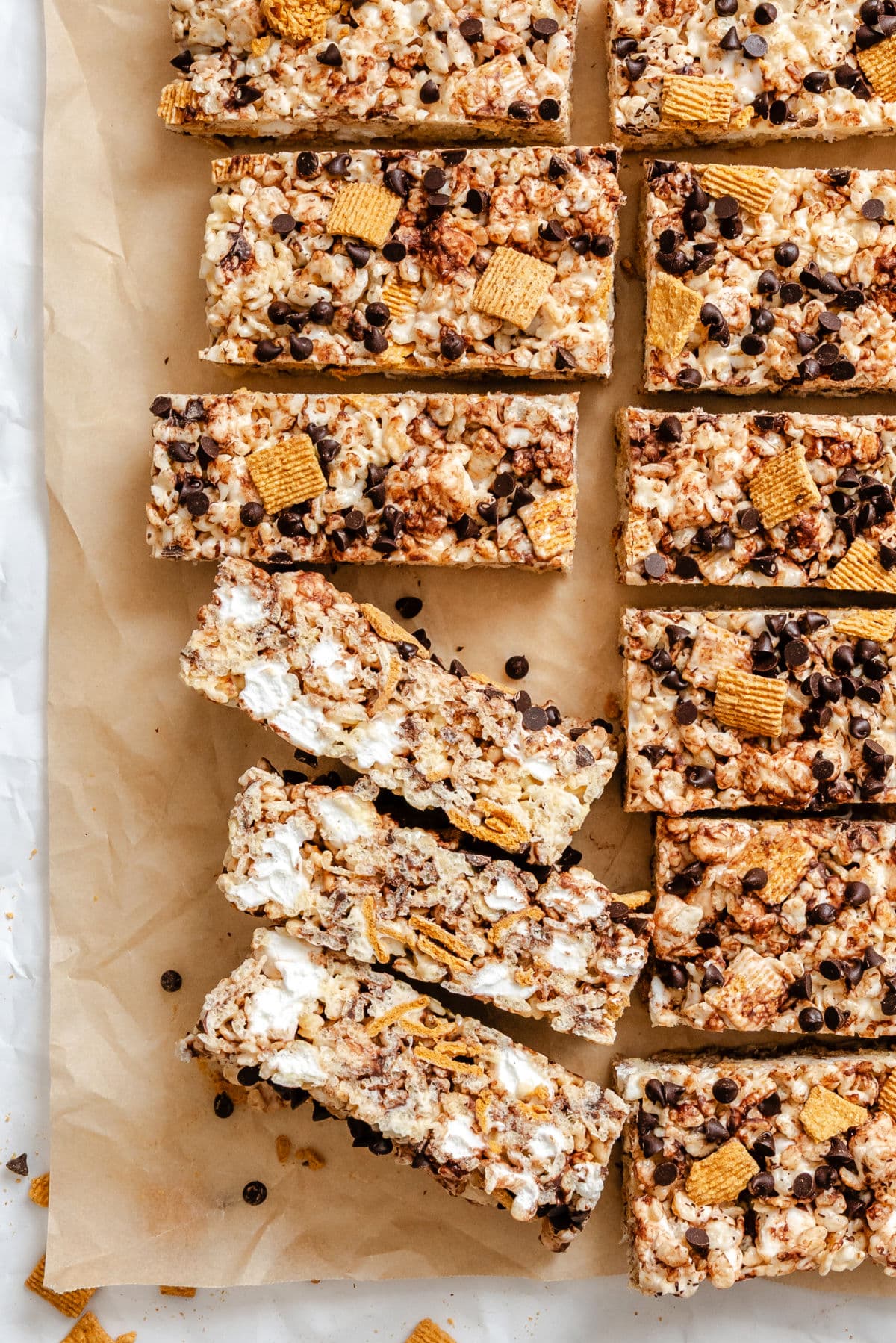 S'mores Rice Krispies treats cut into bars with three on their sides.