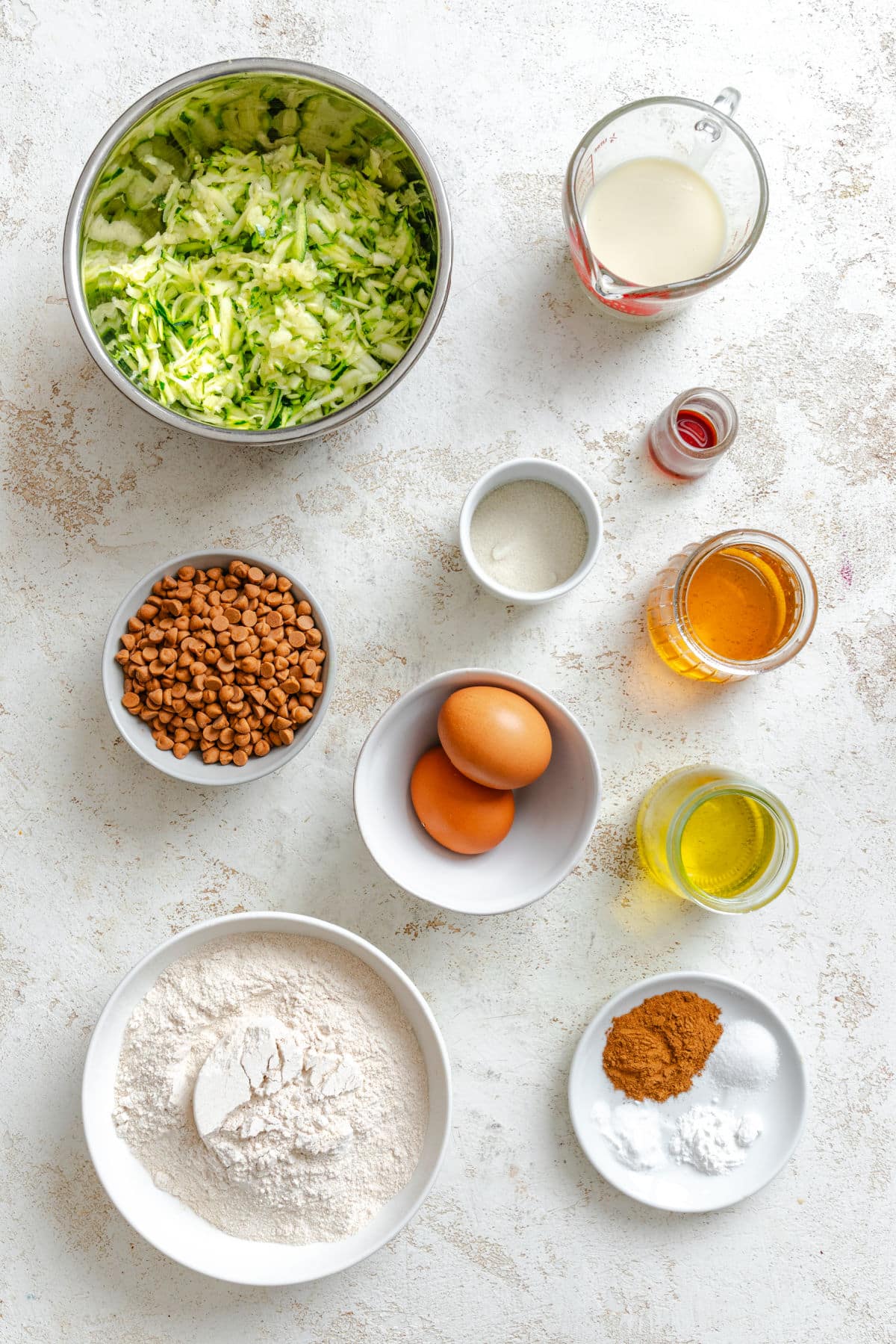 Cinnamon Chip Whole Wheat Zucchini Bread Ingredients for whole wheat zucchini bread in dishes.