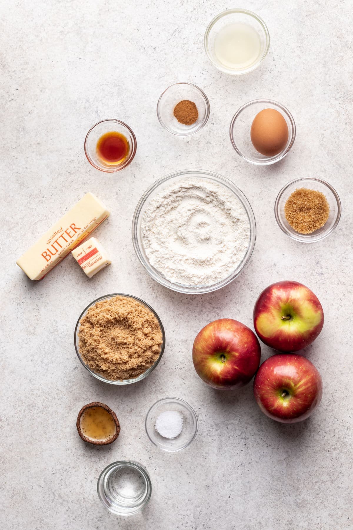 Ingredients for apple galette in dishes.