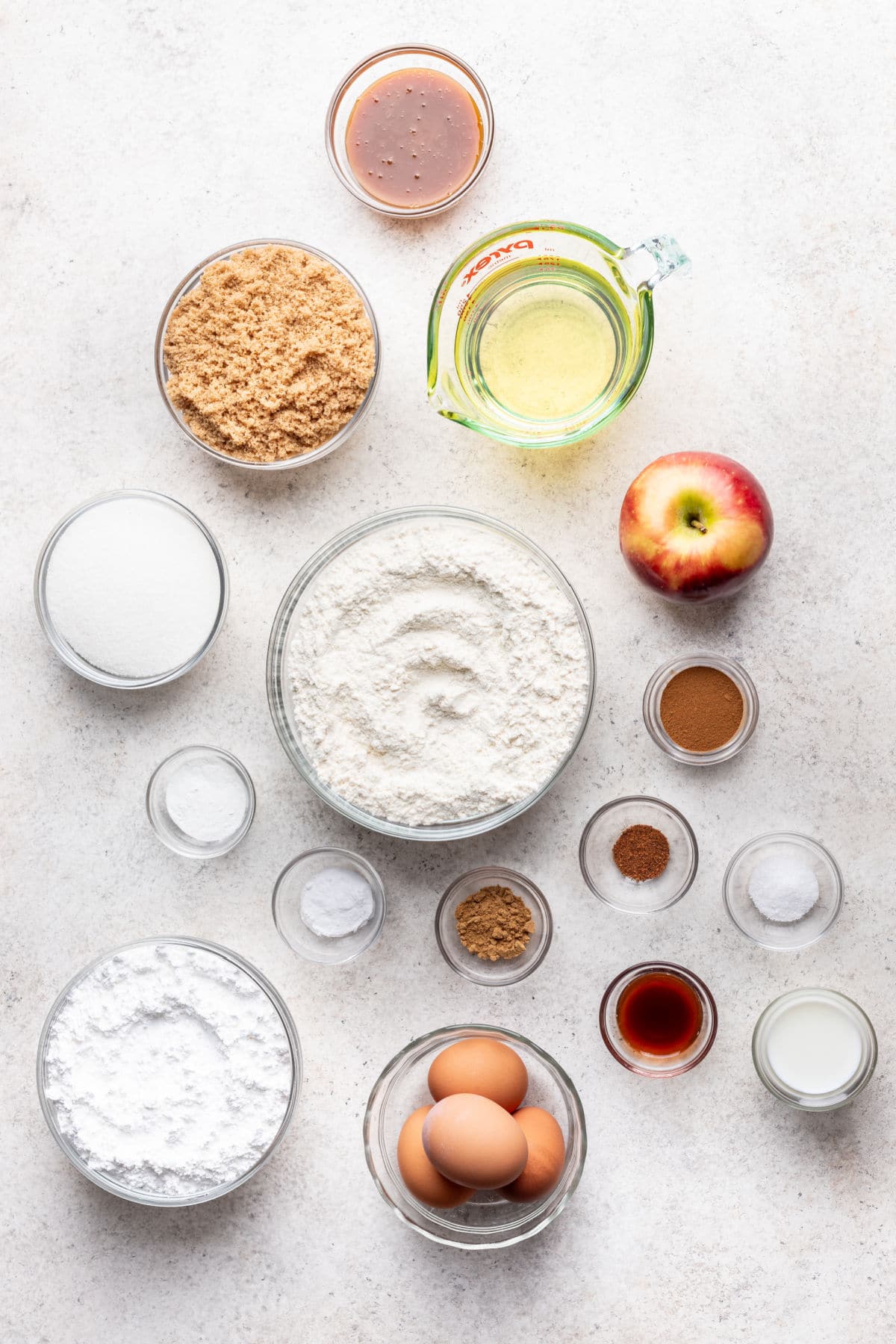 Ingredients for caramel apple sheet cake in dishes.