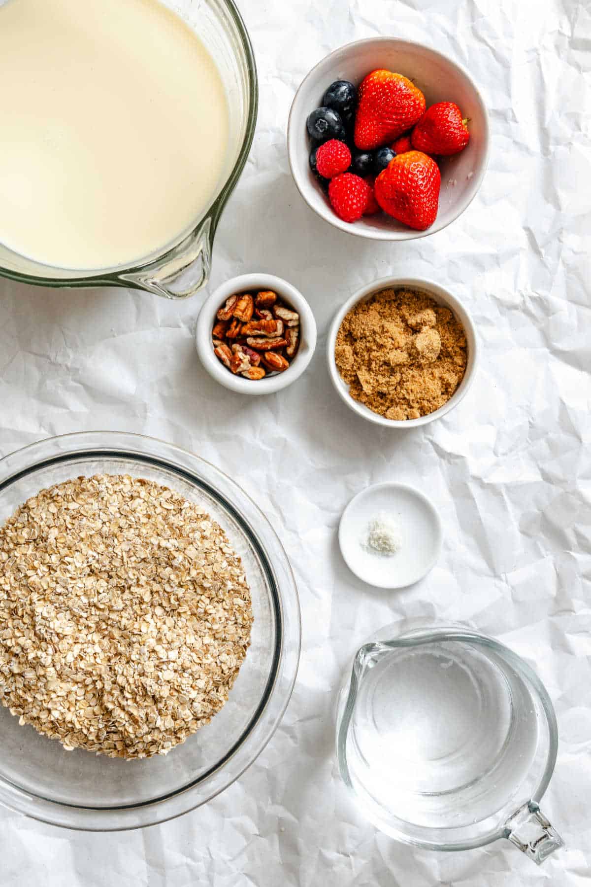Ingredients for freezer oatmeal cups in bowls. 