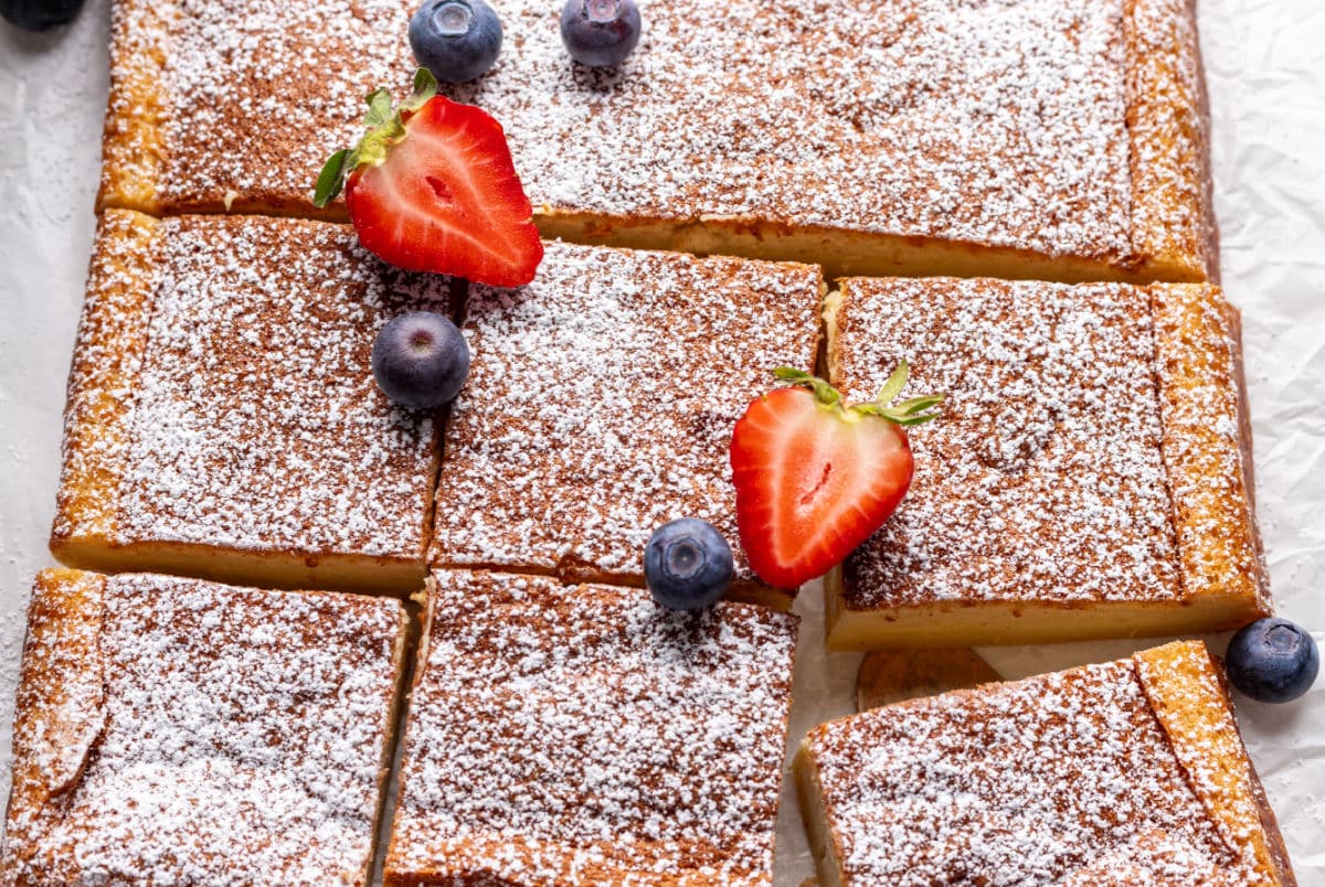 A slice of magic cake being removed from the cake. 