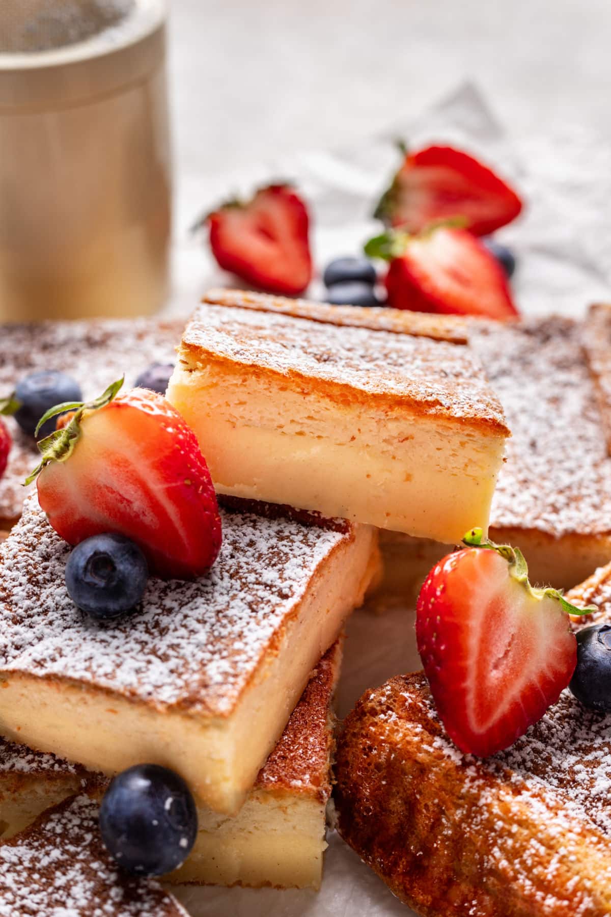 Cut pieces of magic cake stacked on top of each other.