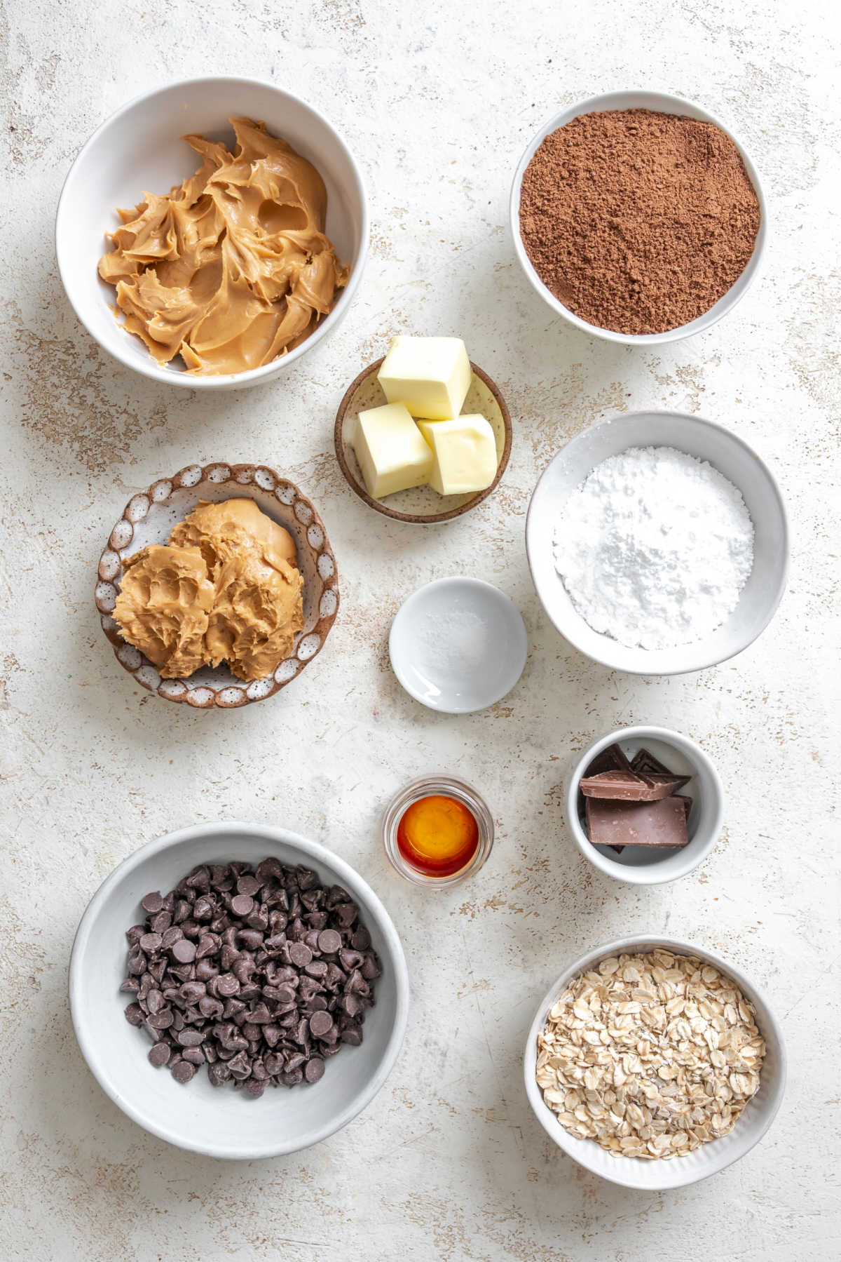 Ingredients to no bake cookie bars in dishes.