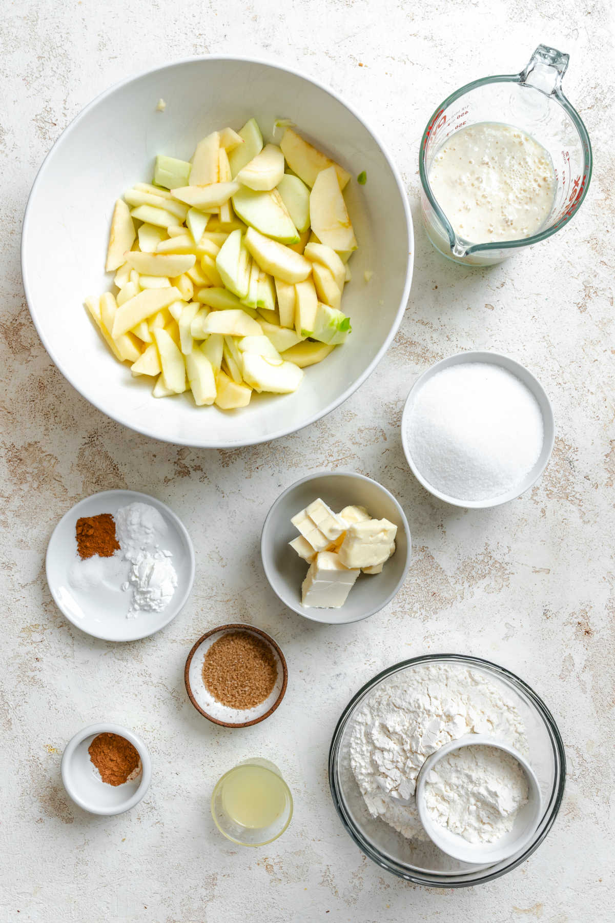 Ingredients for apple cobbler in dishes. 