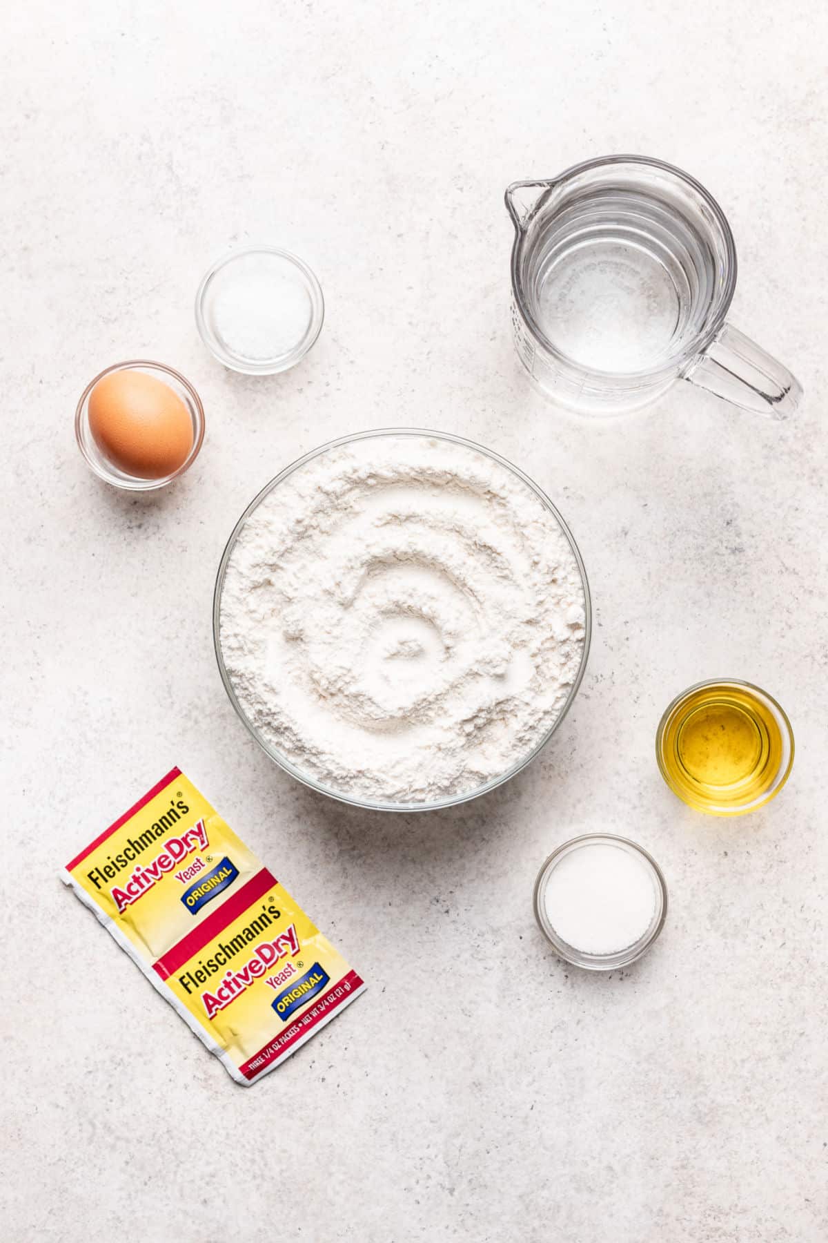 Ingredients for homemade bread bowls in dishes.