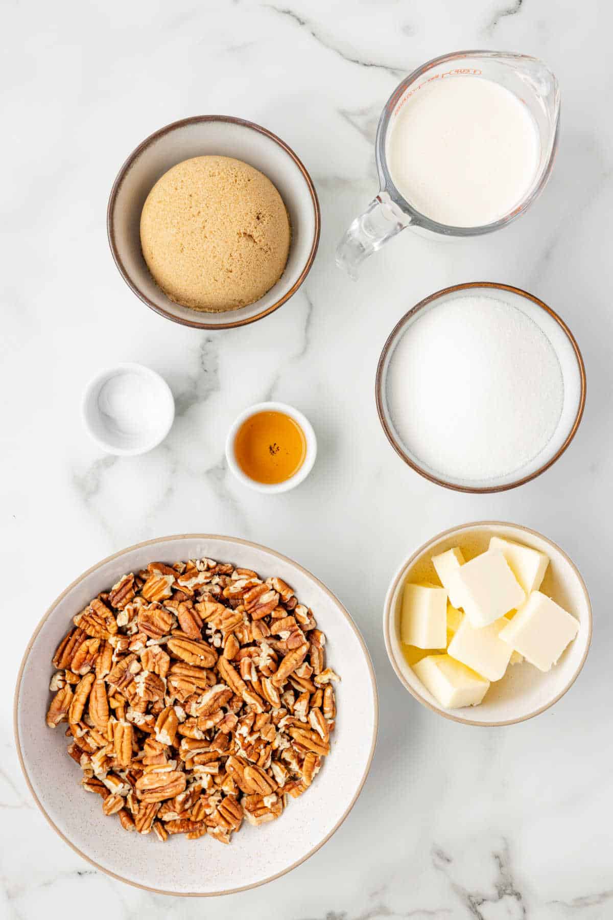 Ingredients for pecan pralines in dishes. 