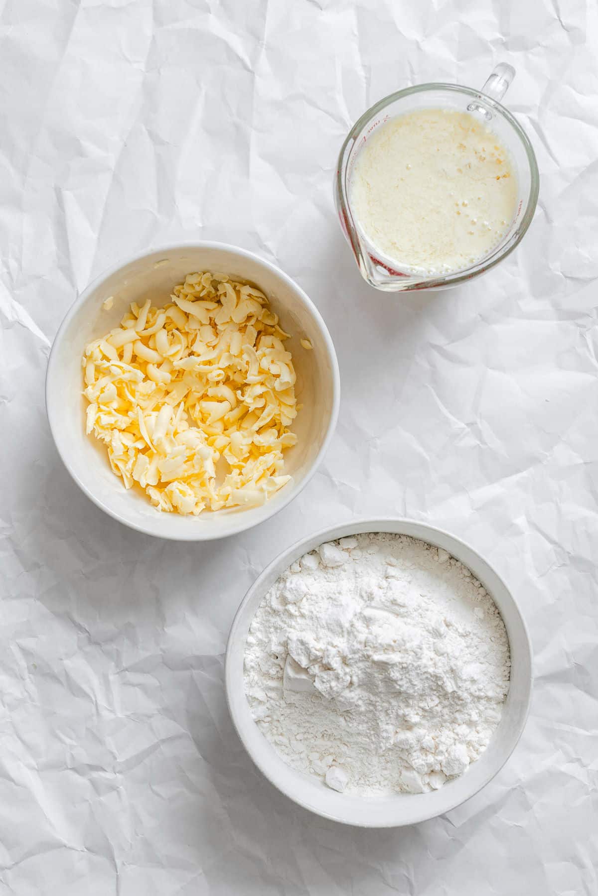 Ingredients for 3 ingredient biscuits in dishes.