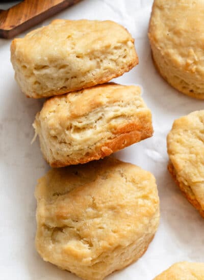 Three 3 ingredients biscuits on their side in a row.