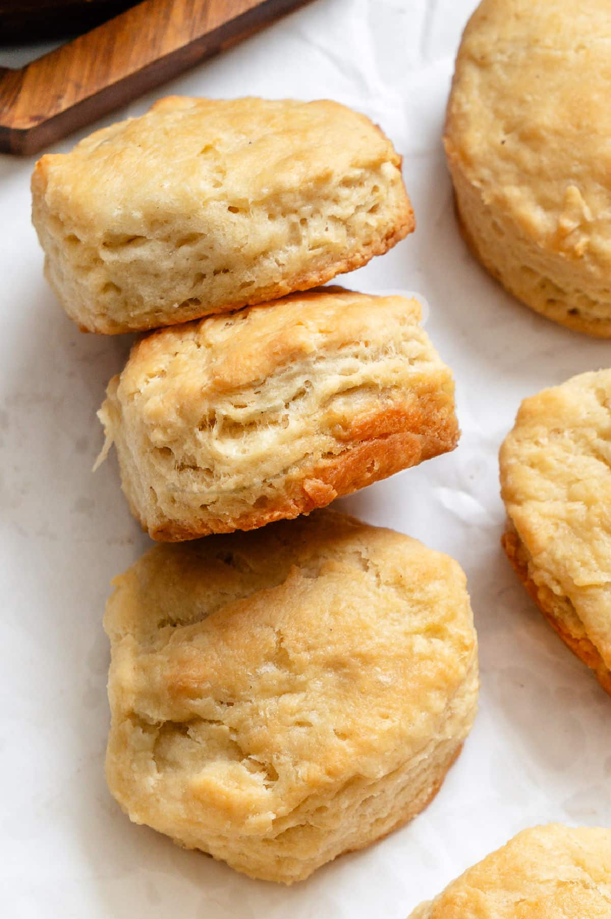 Three 3 ingredients biscuits on their side in a row.