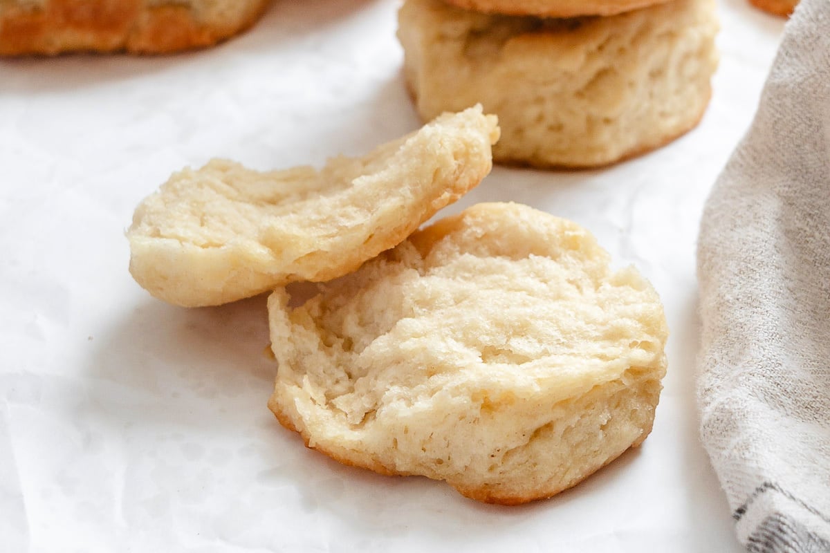 A 3 ingredient biscuits broken in half.