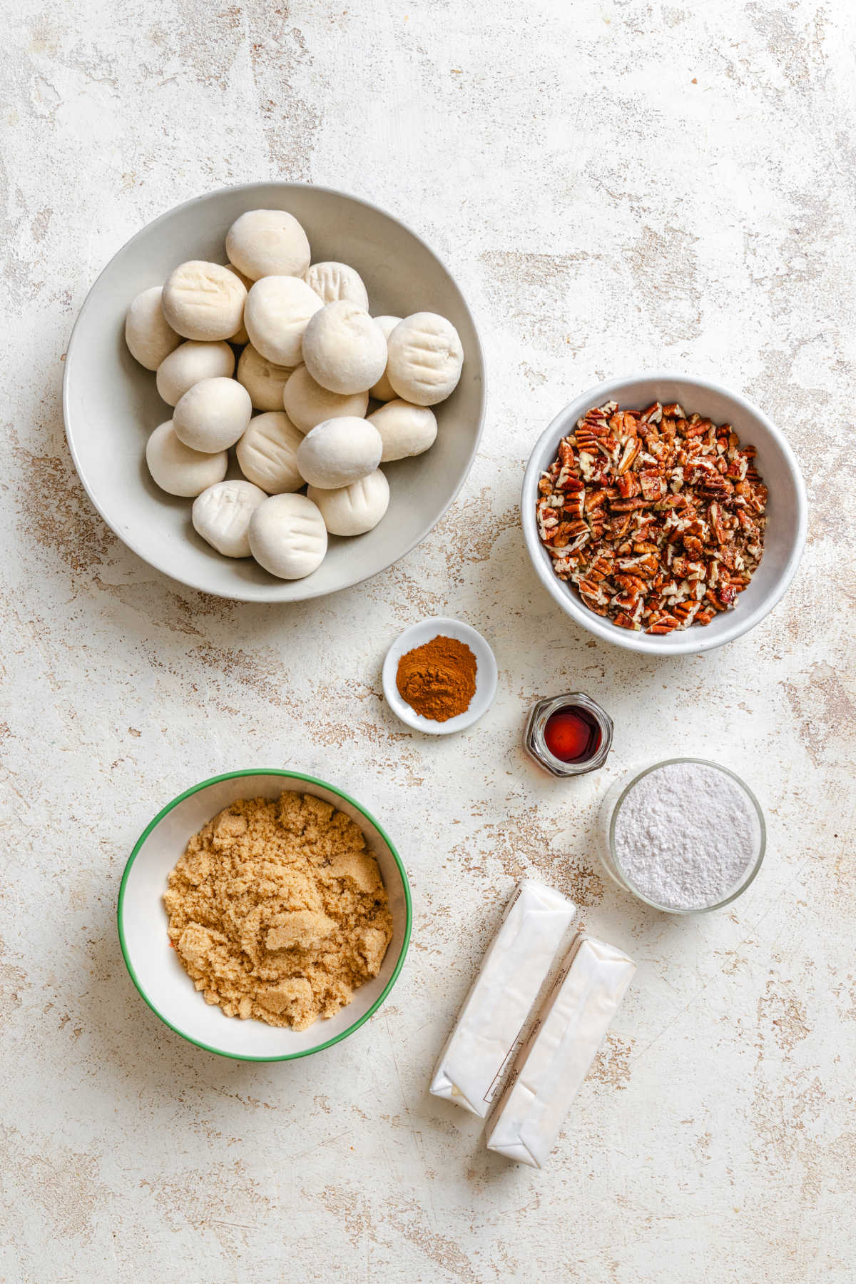 Ingredients for overnight sticky buns in dishes. 