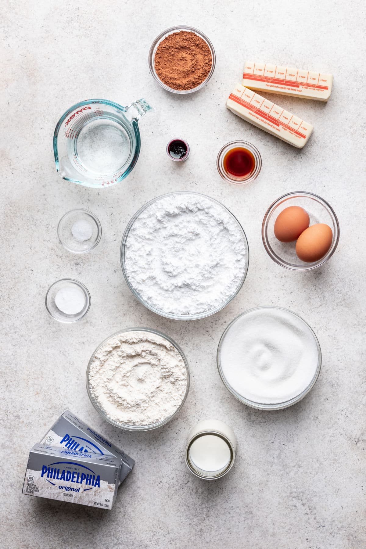 Ingredients for red velvet layer cake in dishes.
