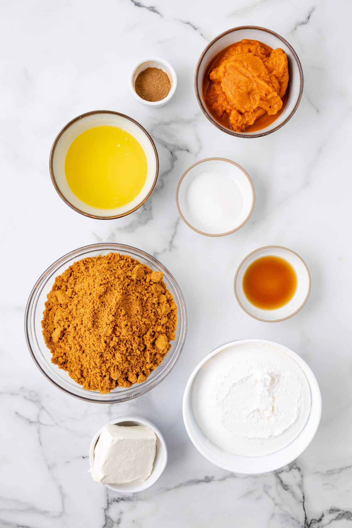 Ingredients for no bake pumpkin pie in dishes.