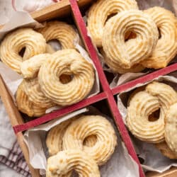 Danish butter cookies in a wooden box tied with red ribbon.