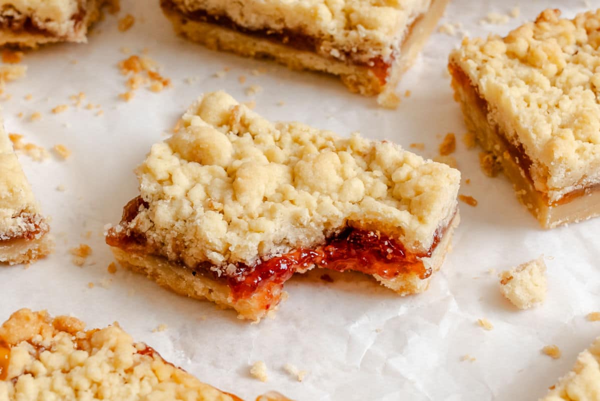 Jam Bar Recipe A jam bar with a bite missing in the center of jam bars.