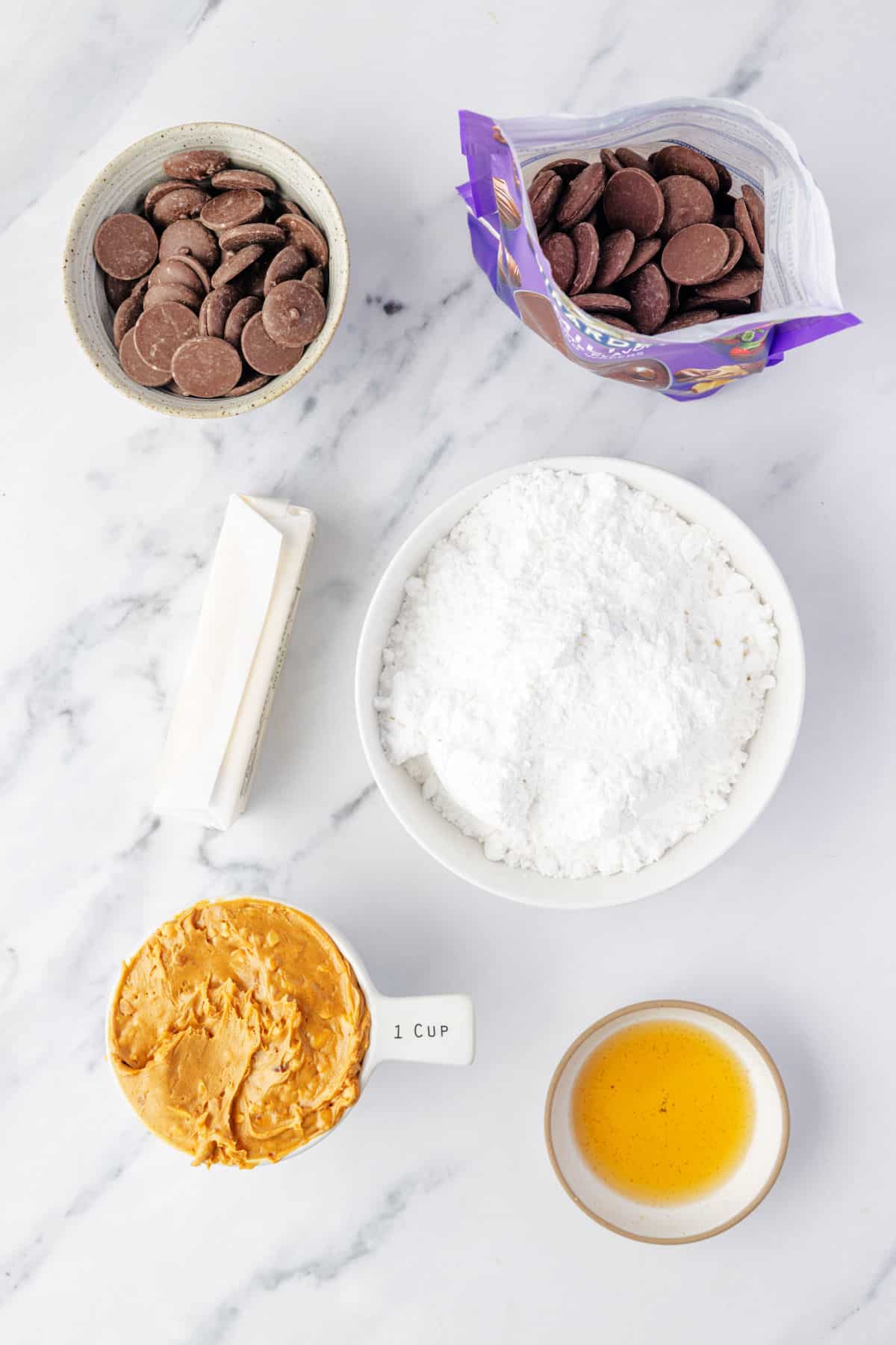 Ingredients for peanut butter balls in dishes.