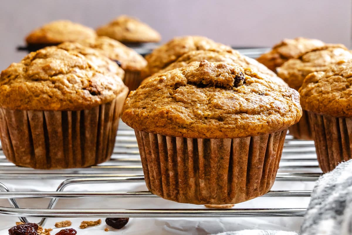 Refrigerator bran muffins on a wire cooling rack. 