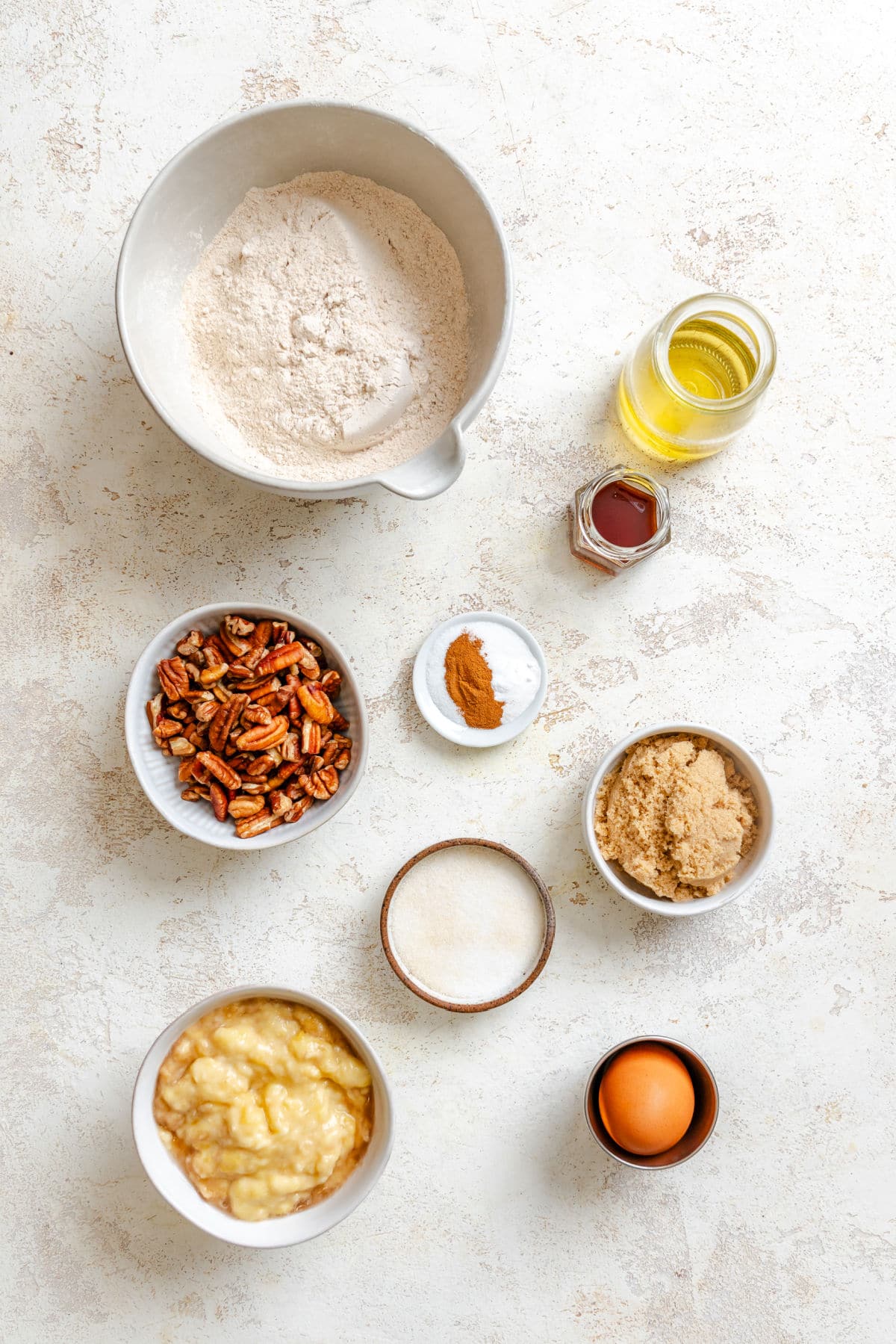 Ingredients for whole wheat banana bread in dishes.