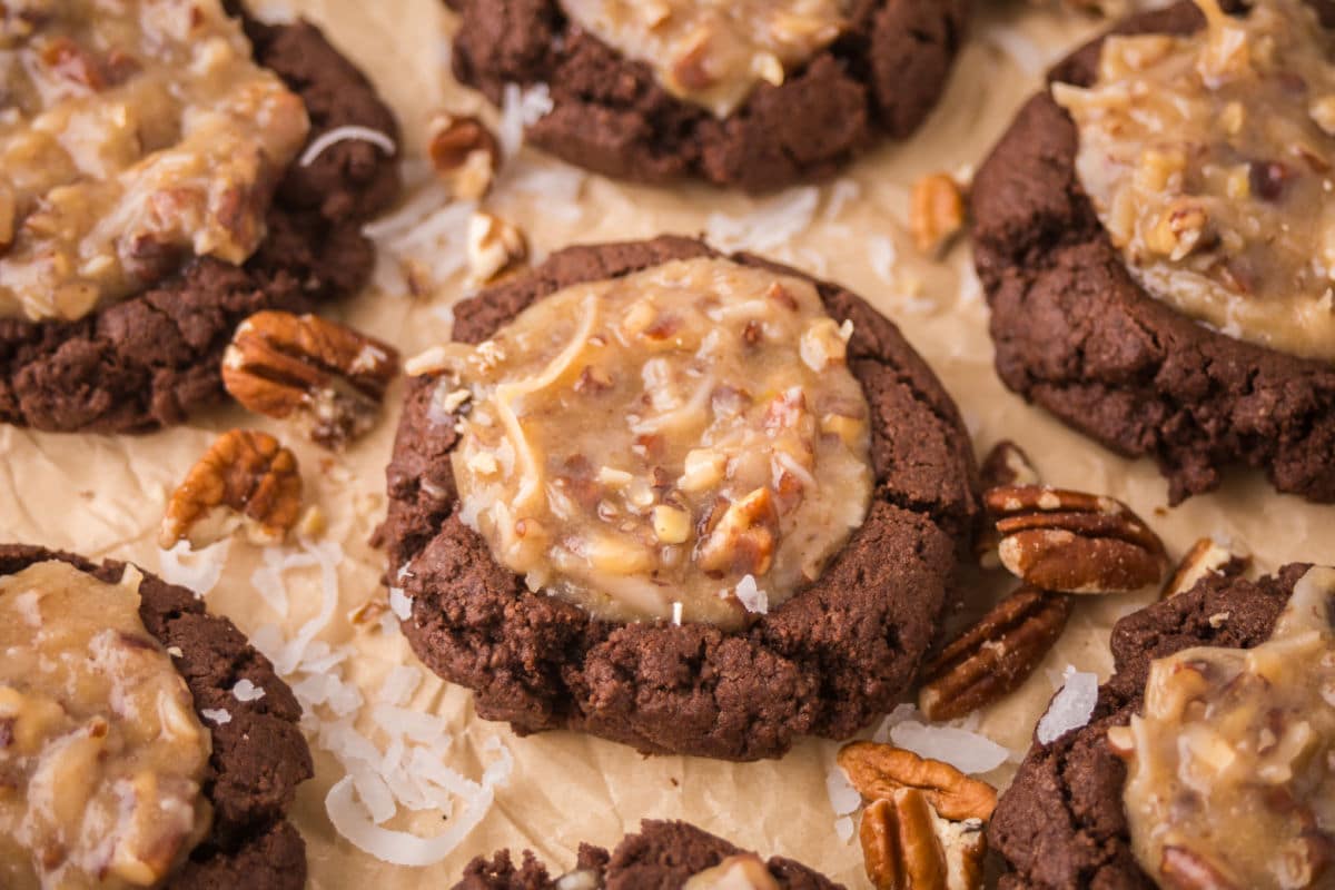 German chocolate thumbprint cookies surrounded with pecans and coconut.