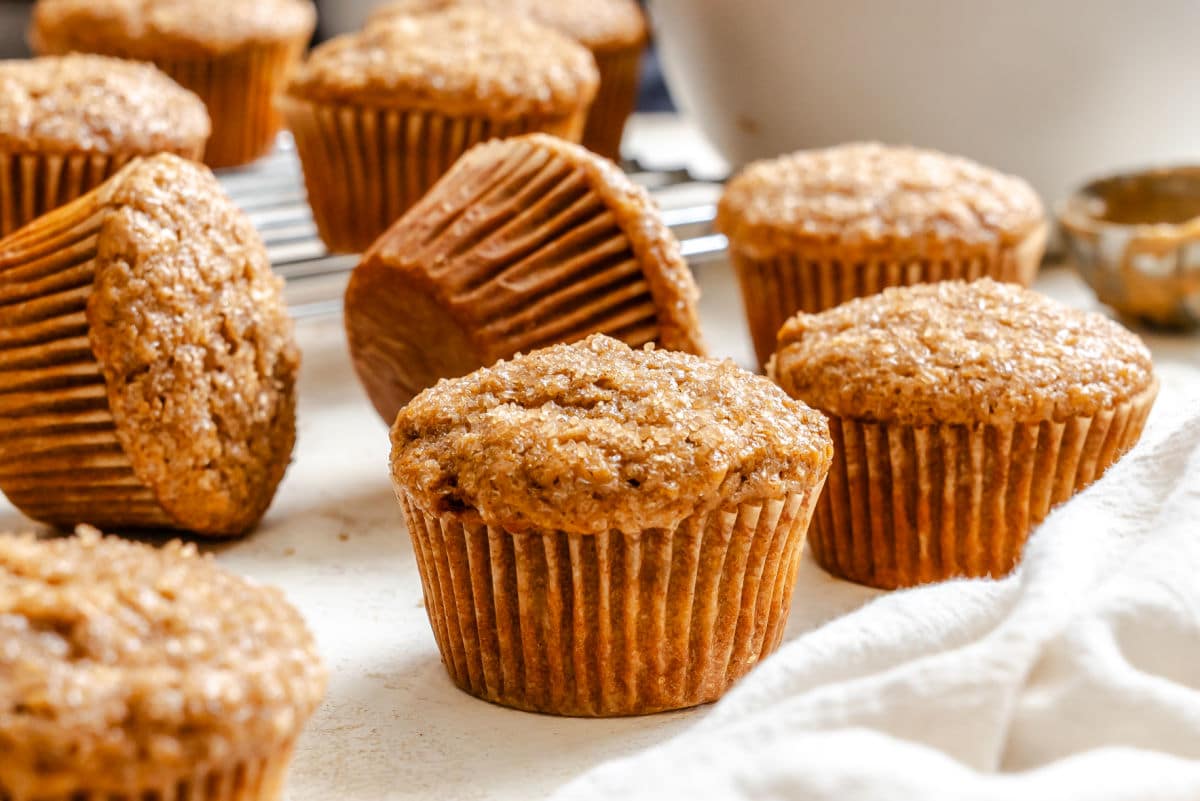 Applesauce muffins at an angle next to each other.