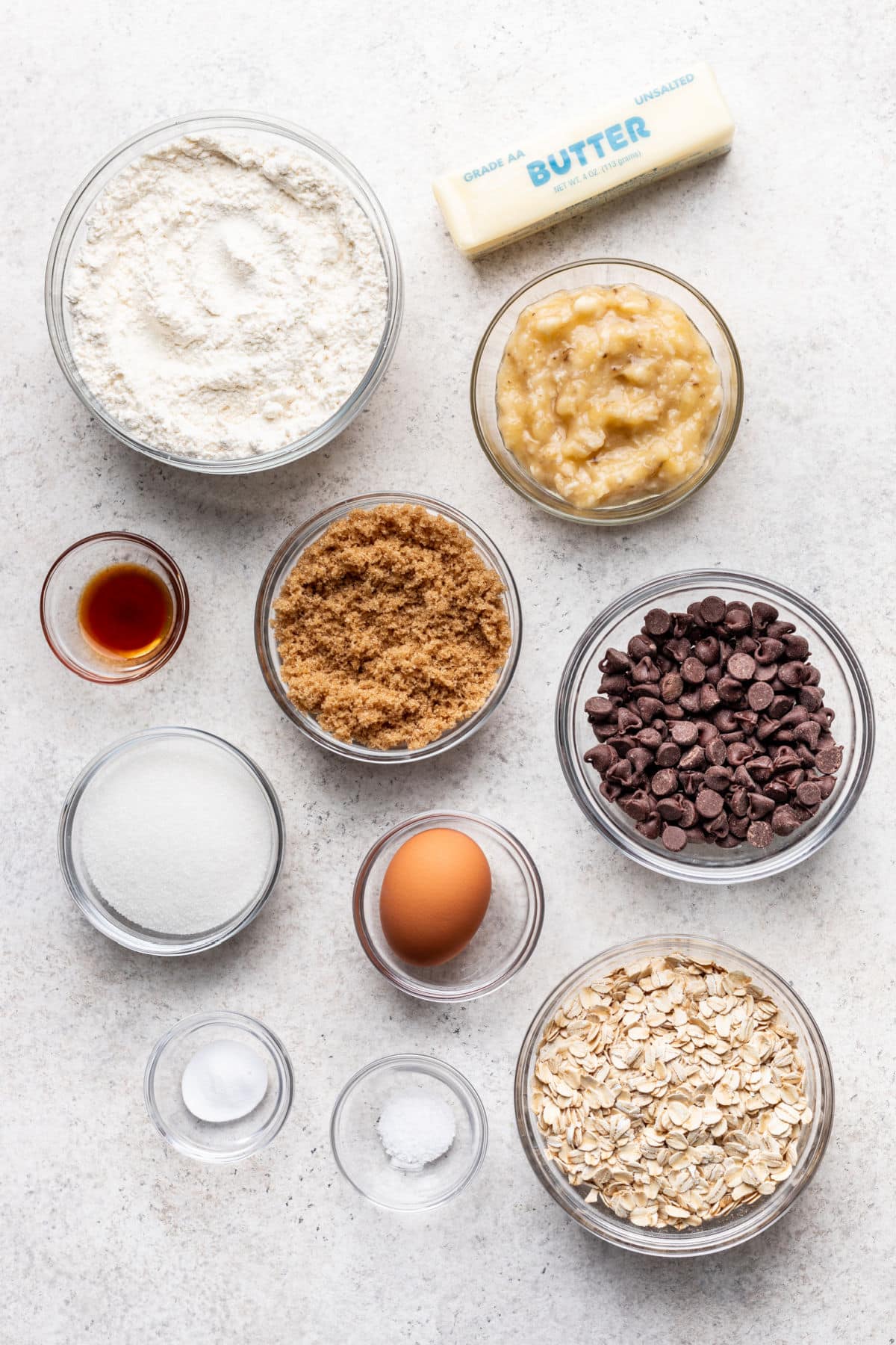 Ingredients for banana oatmeal cookies in dishes.