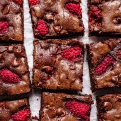 Rows of cut chocolate raspberry brownies.