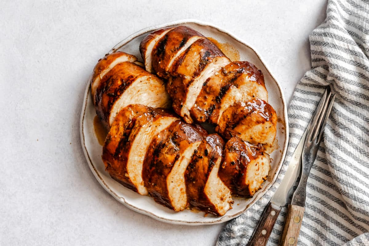A plate of grilled, sliced everyday chicken marinated chicken.